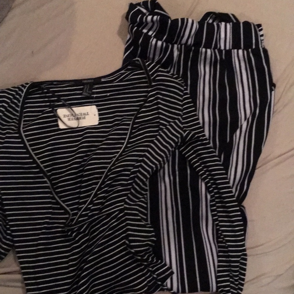 Black and white striped knit wrap top